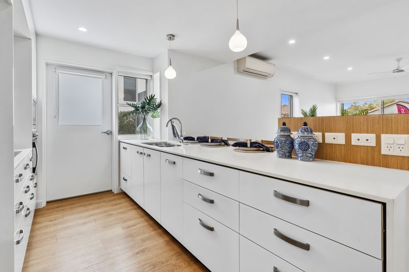 Modern spacious two-bedroom villa with attached garage and access to resort-inspired amenities!