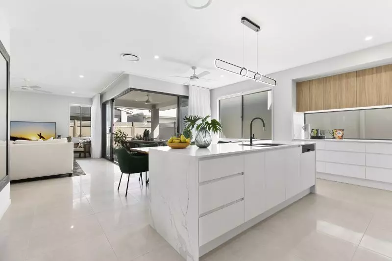 STUNNING DISPLAY HOME FACING TRANQUIL LAKE