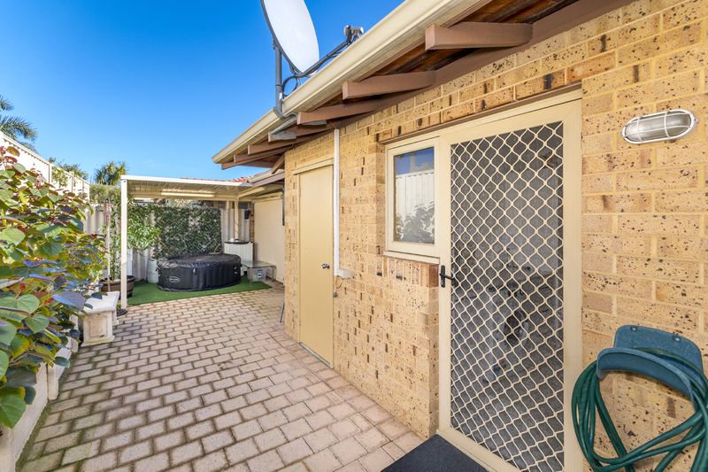 Sunny Yard and Vibrant Village Lifestyle