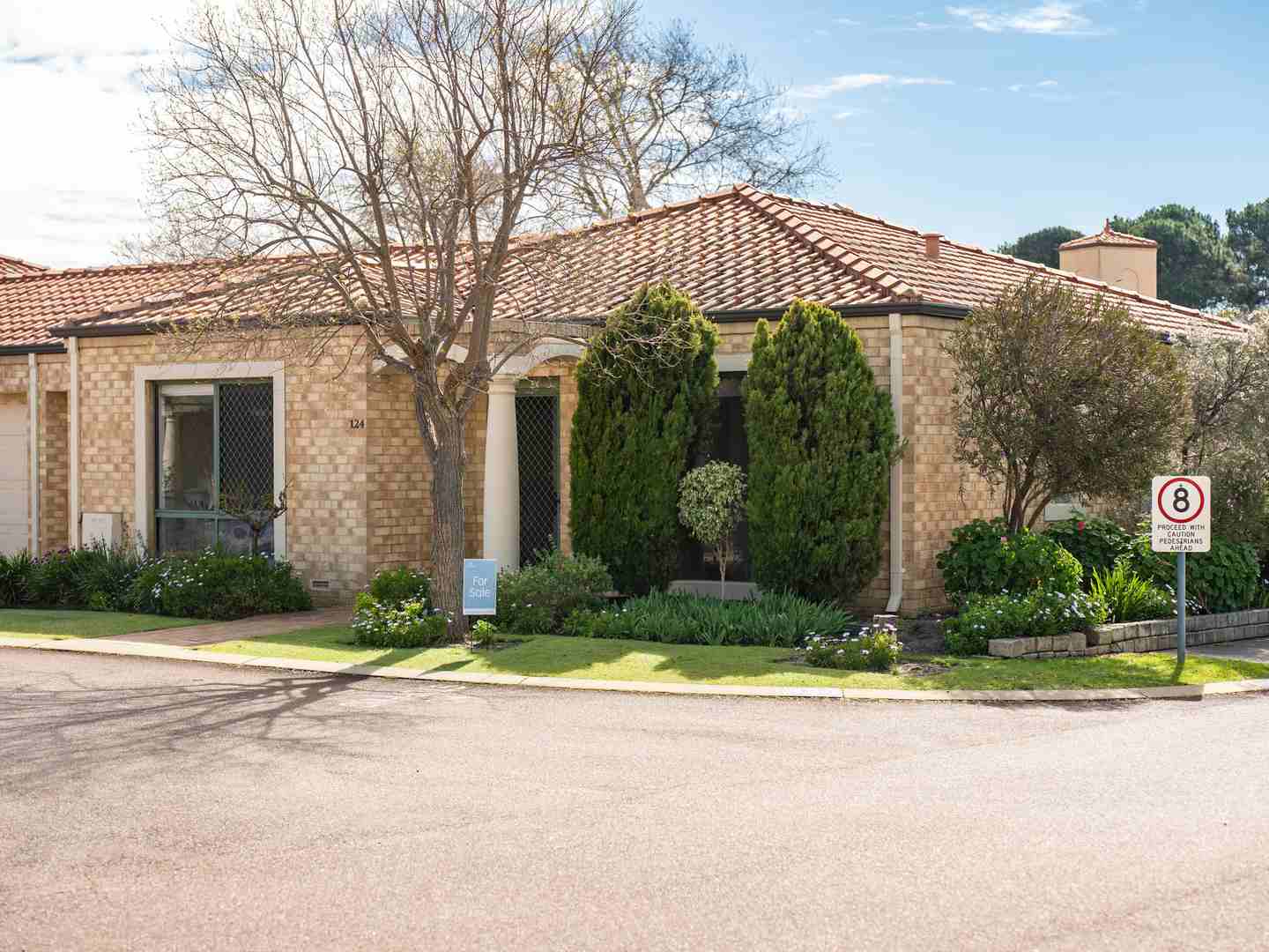 Renovated corner villa with bowling green views