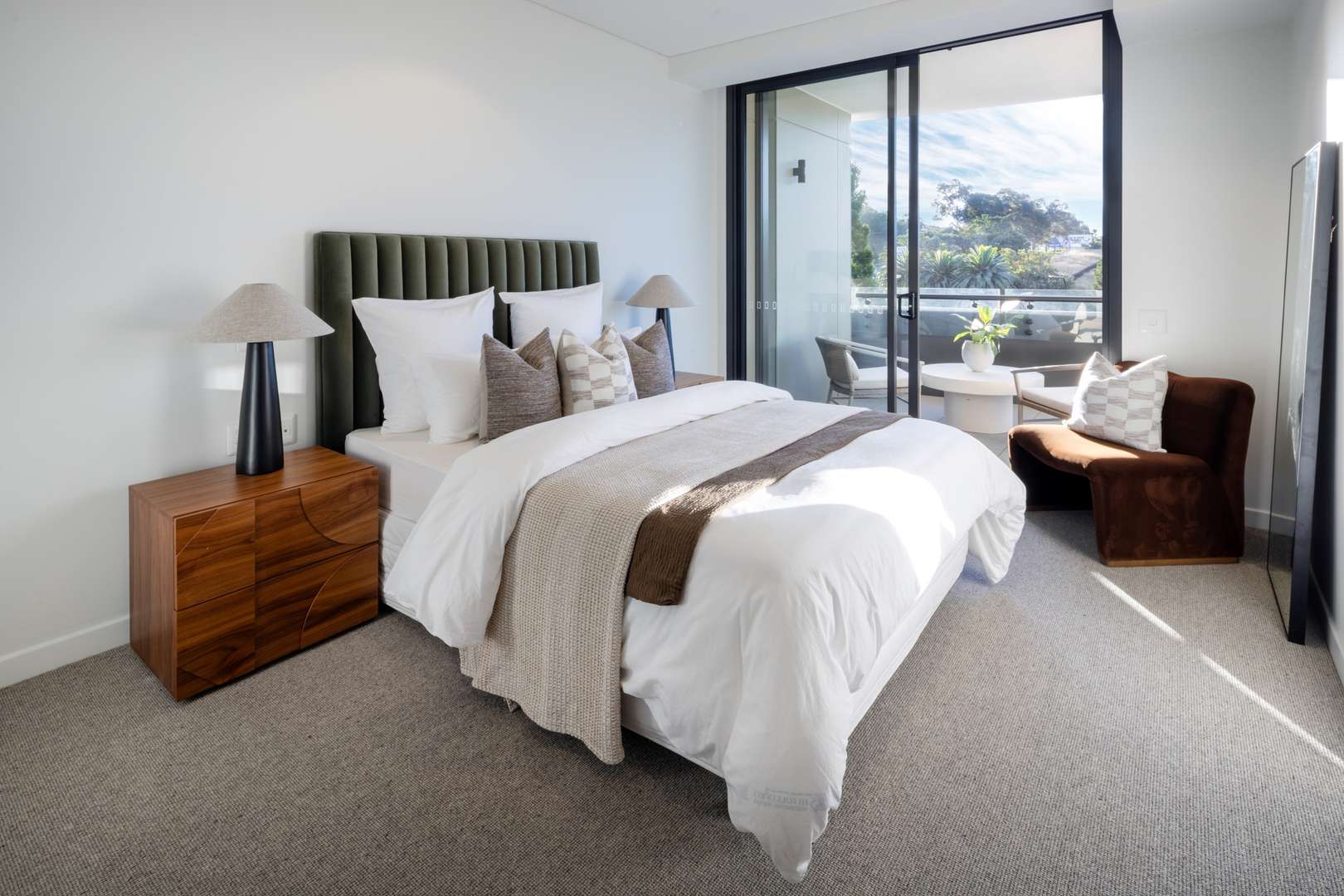 Generous, light-filled two-bedroom residence with a private balcony
