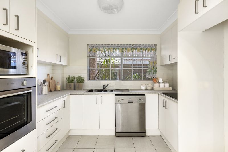 Perfectly located ground floor unit with tranquil garden surrounds.