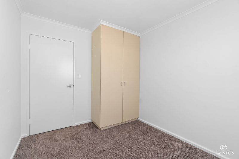 SOLD! A bright, light filled unit with a sunroom and leafy outlook
