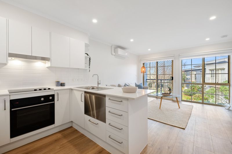 Stylish Upgraded Apartment in Prime Village Setting