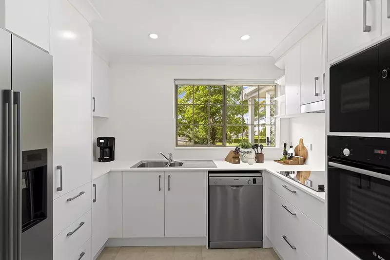 Newly renovated upper unit with easy access, lovely lawn views and close to the clubhouse.