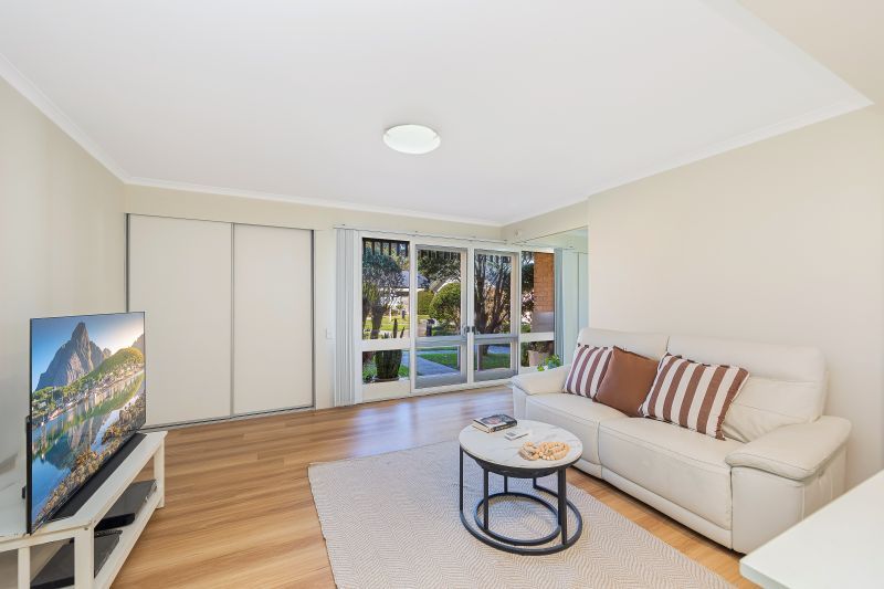 Secure Parking, Low Maintenance Unit Ground Floor Living with Modern Finishes!