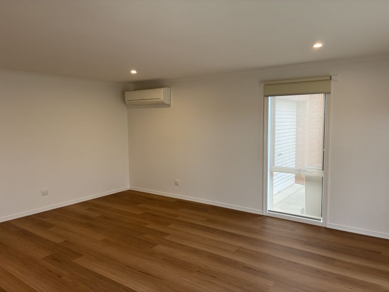 Beautifully Refurbished Two-Bedroom Home Opposite the Community Centre