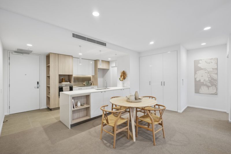 Elegant two-bedroom apartment with peaceful, tree-lined outlooks