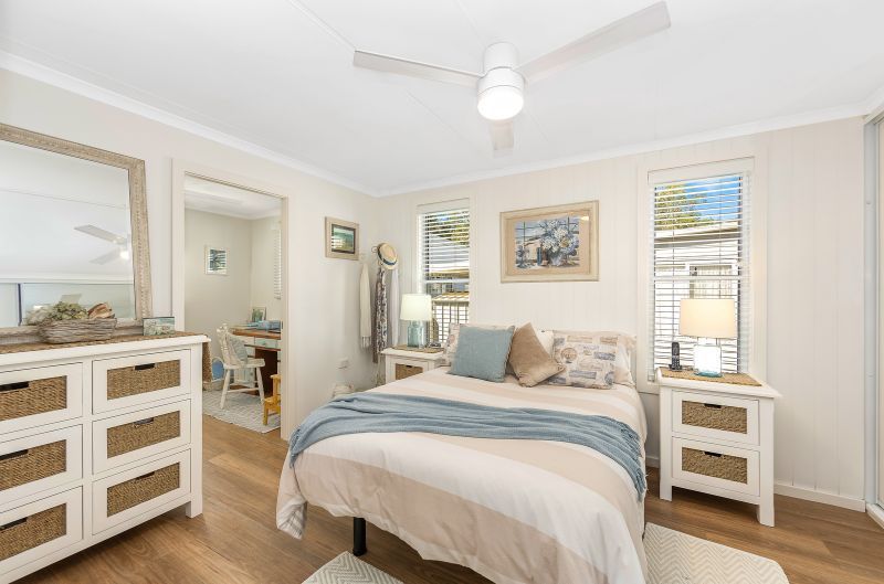 Coastal Gem! Stylish Updates & Serene Green Space