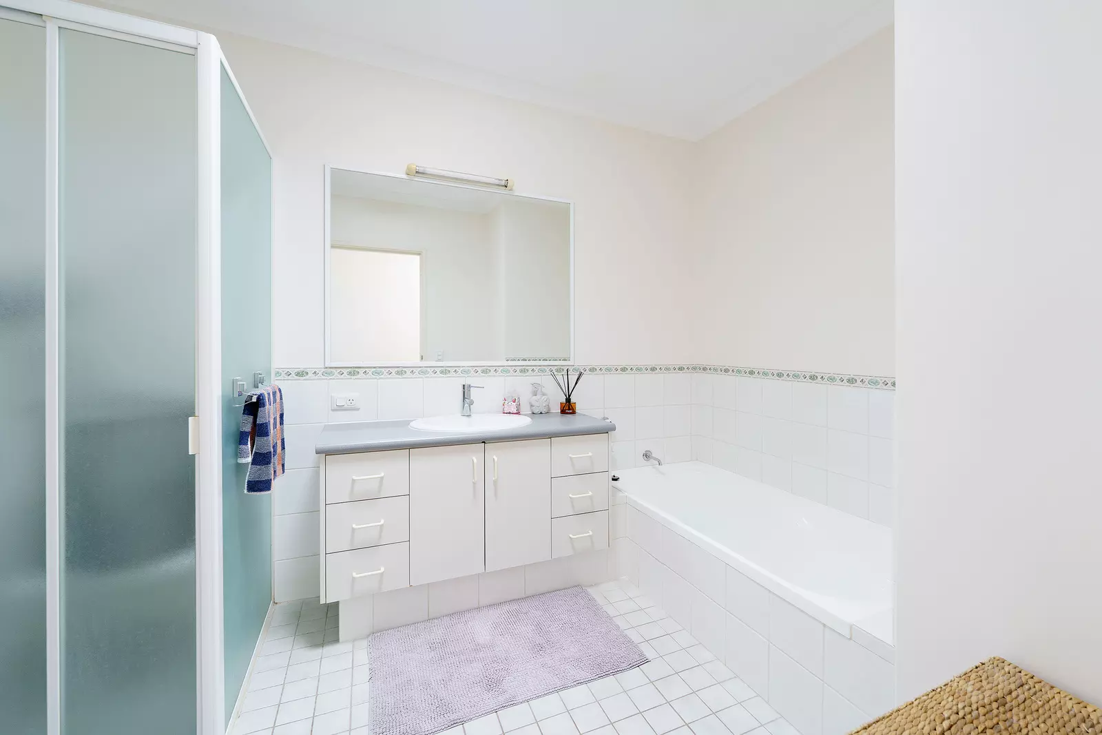 Light-filled corner home with garden views & north-facing courtyard