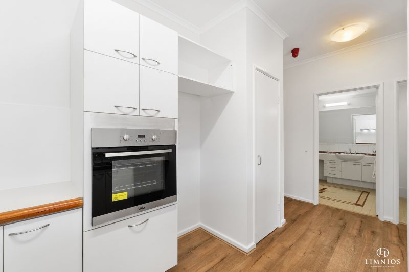 UNDER OFFER. Light-filled, Ground Floor Apartment with Wrap-Around Courtyard