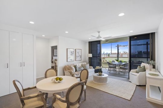 Light-filled north-facing terrace with bowling green views