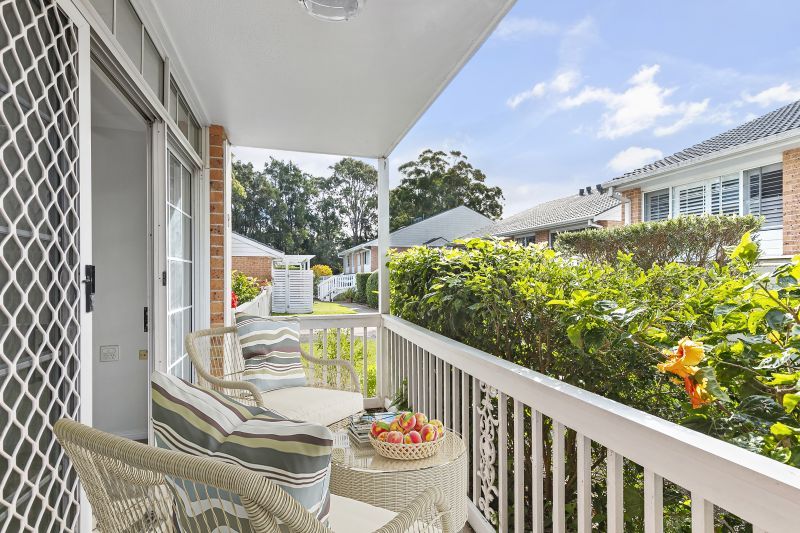 Centrally located, renovated ground floor unit surrounded by lush gardens with large courtyard.