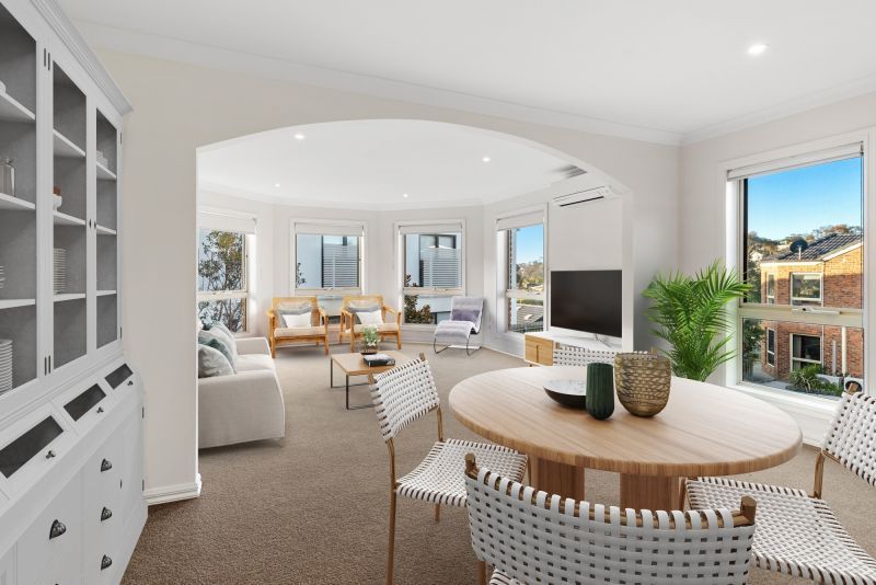 Spacious, light-filled 2br unit with bay windows & garden views