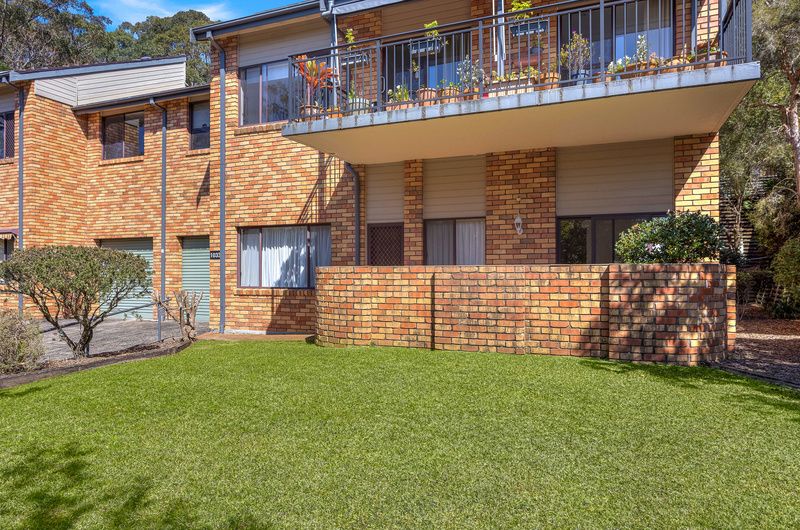 Sunlit Lower-Level Home with Courtyard