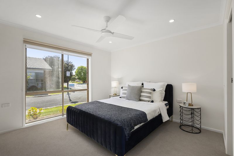 Stylish, Sunlit Unit with Private Backyard and Modern Upgrades