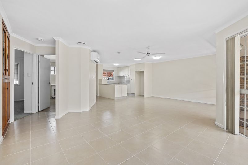 Beautiful two-bedroom, one bathroom villa with covered rear entertaining area.