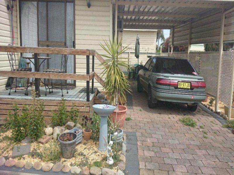Lovely sunny 2 bedroom home. Easy access into a  large carport.