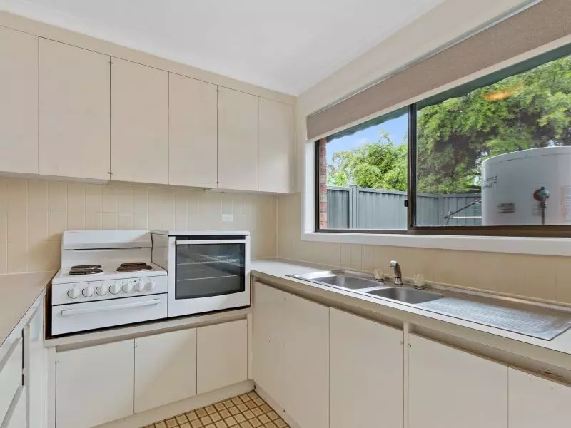 Private, Updated Unit with Courtyard in a Friendly Village Setting