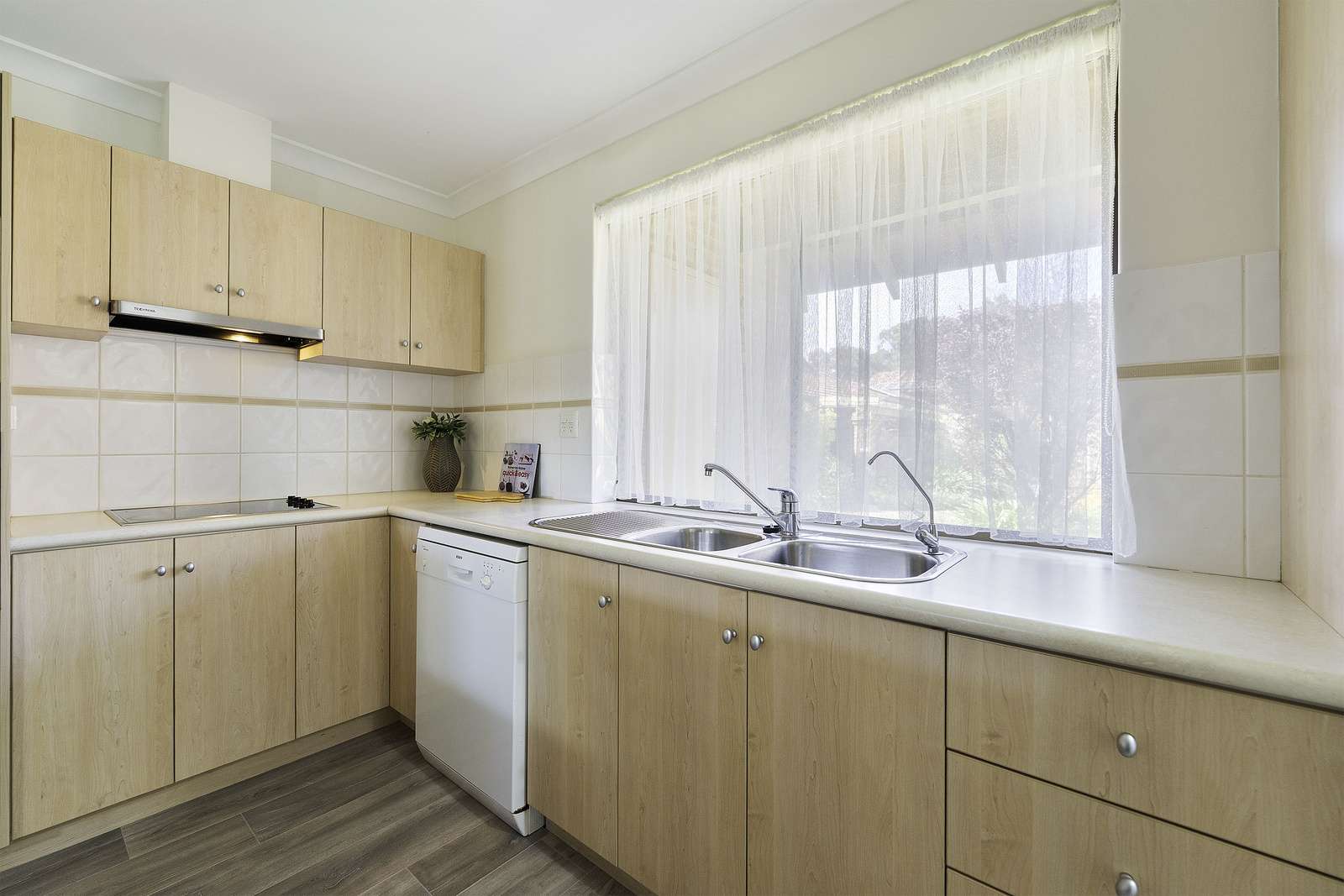 Enjoy garden views in a sought-after village location