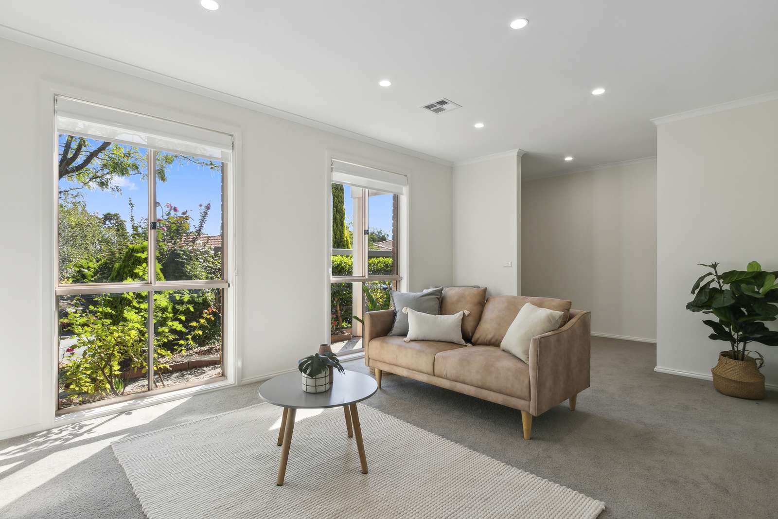 Exclusive three-bedroom villa featuring a pristine backyard