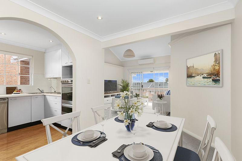 Perfectly located unit overlooking lush, green gardens.