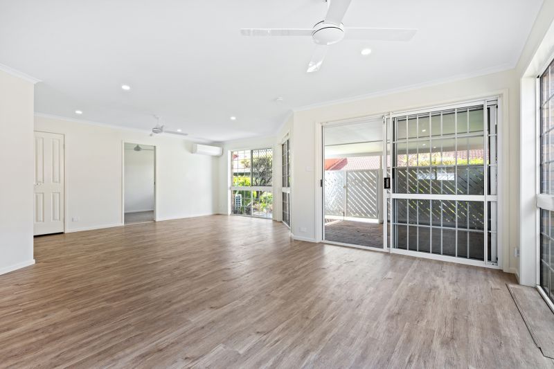 Beautiful two-bedroom, one bathroom villa with covered rear entertaining area.