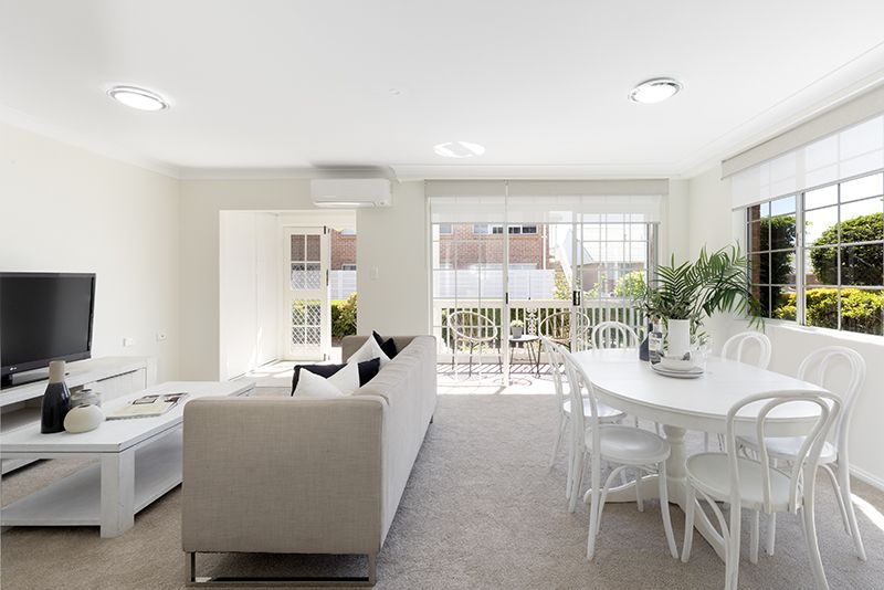 Surrounded by lovely gardens, beautifully renovated ground floor sun-filled unit, right opposite the croquet lawn.