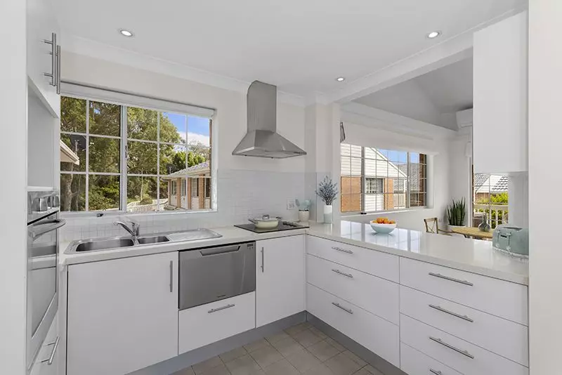 This elegant north east facing two bedroom unit offers refined living in a peaceful, private setting.