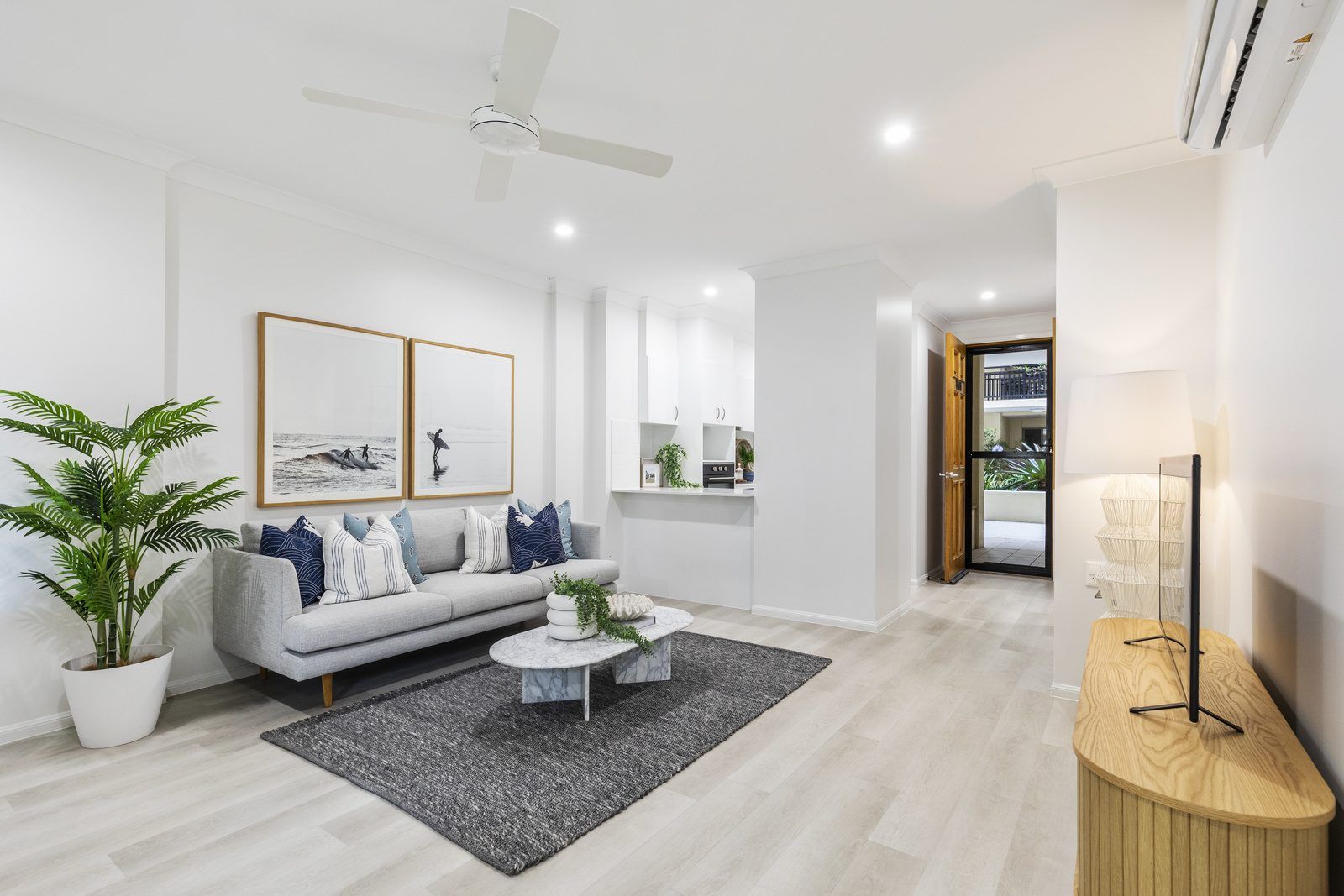 Modern one-bedroom apartment with large balcony.