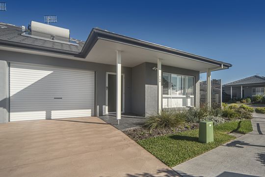 Spacious two-bedroom villa, just steps from the community village
