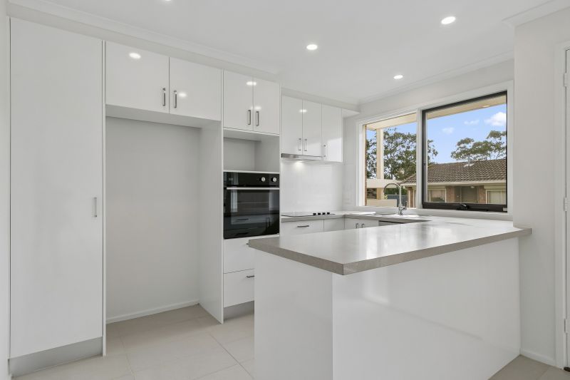 Beautifully presented two-bedroom villa with a charming spacious backyard