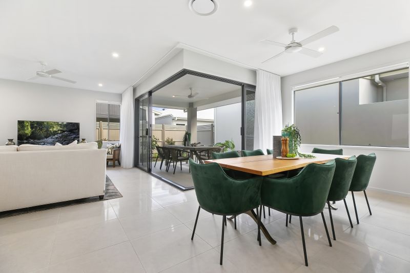 STUNNING DISPLAY HOME FACING TRANQUIL LAKE