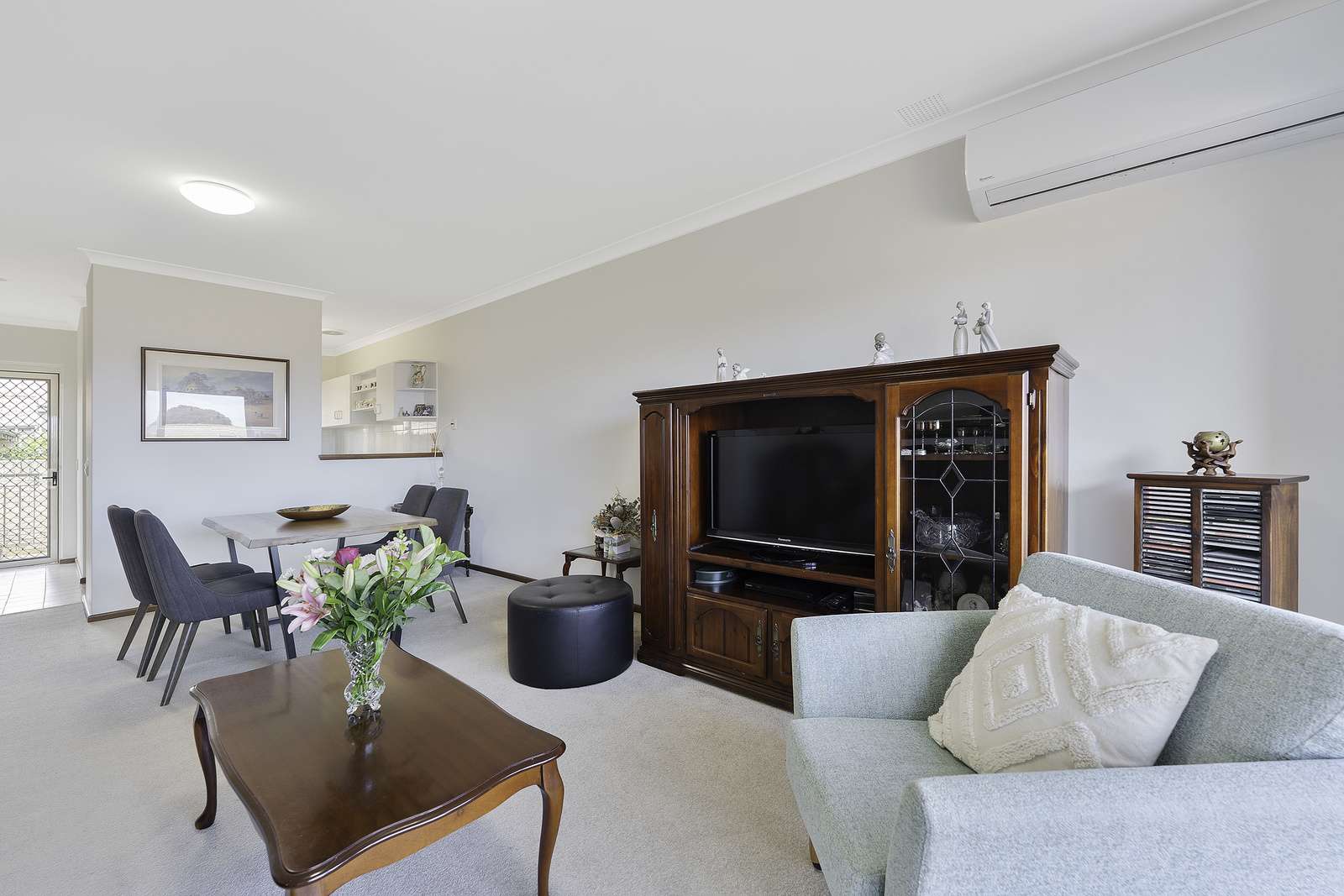 Move-in ready upper villa with sunny west-facing balcony