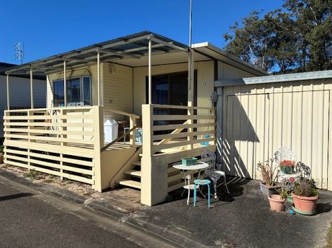 UNDER CONTRACT - 2 Bedrooms - Large Front Veranda - Garage