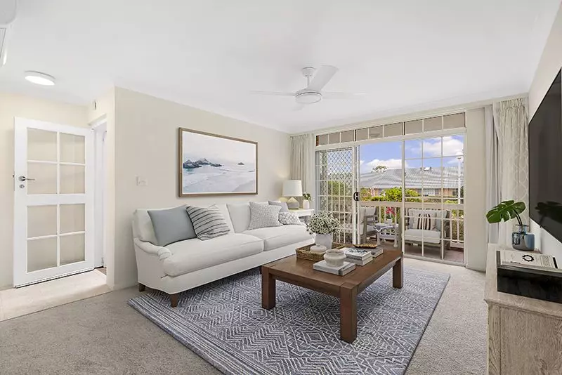 Elegantly renovated ground floor unit overlooking beautiful gardens close to clubhouse.