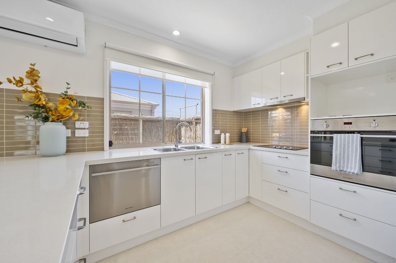 Corner Home with Sunny Courtyard and Village Lifestyle