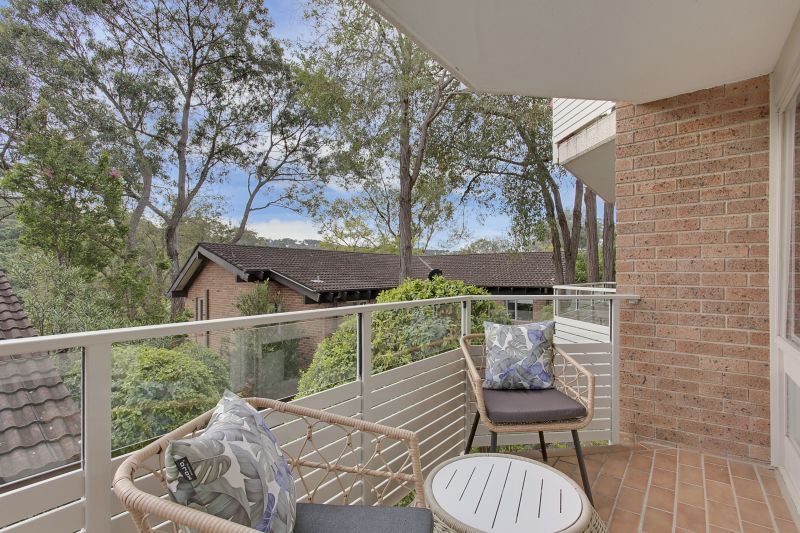 Serene two-bedroom haven overlooking lush forest