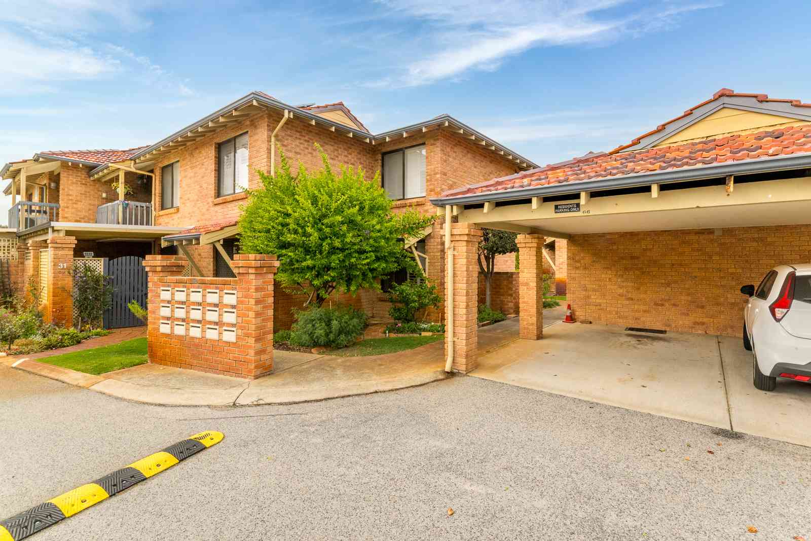 Freshly updated villa with garden views & sunny east-facing balcony