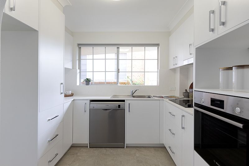 Perfectly located, renovated ground floor unit with surrounding gardens.