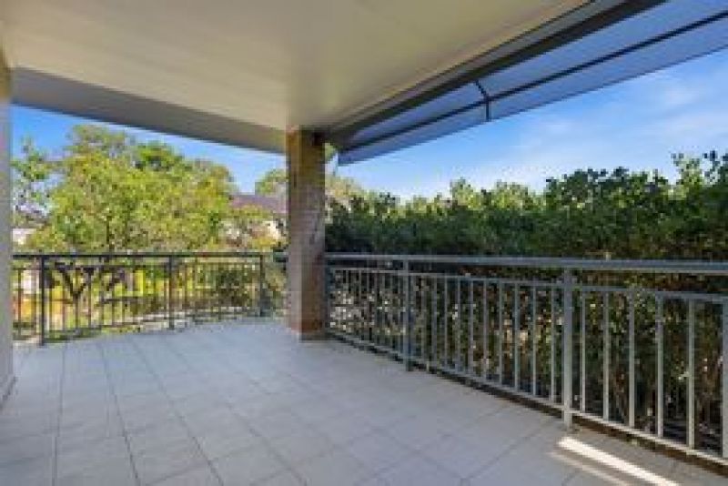 One of a kind corner unit with a wrap around balcony