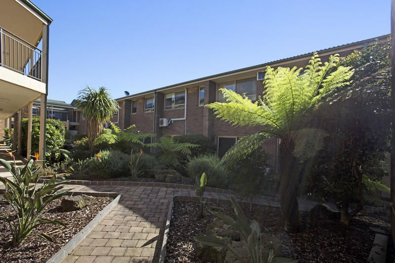 Easy Living Overlooking Peaceful Courtyard Gardens