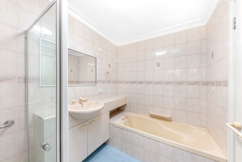 ELEVATED OVERLOOKING THE WELL MANICURED GARDENS