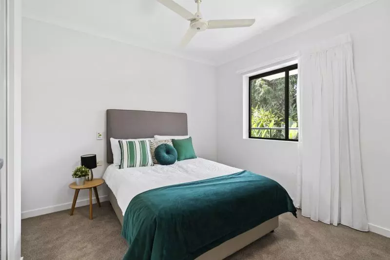 Elevated one-bedroom apartment in peaceful green setting