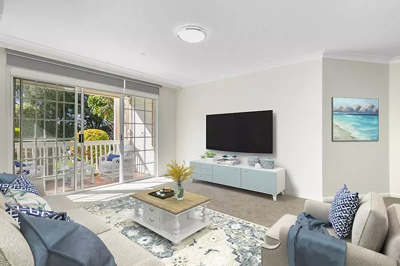 Newly renovated and superbly positioned unit with sunny front terrace and large courtyard.