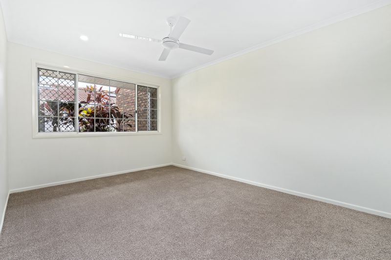 Beautiful two-bedroom, one bathroom villa with covered rear entertaining area.