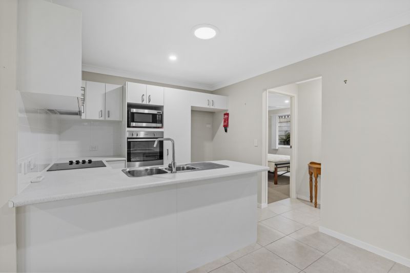 Lush Garden Views & Carefree Living!