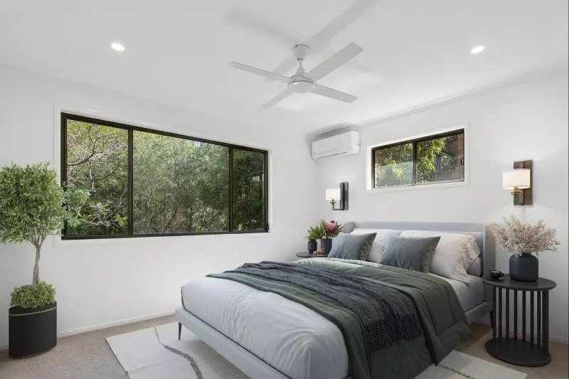 Charming two-bedroom apartment surrounded by lush greenery