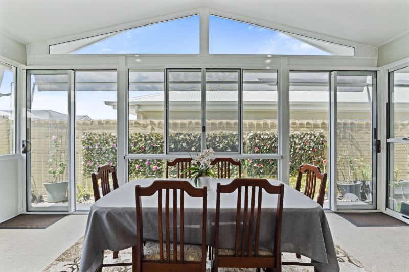 Hidden Oasis with Stunning Sunroom!