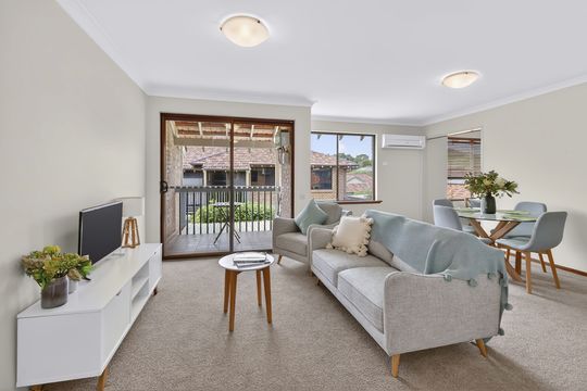 Freshly updated villa with garden views & sunny east-facing balcony